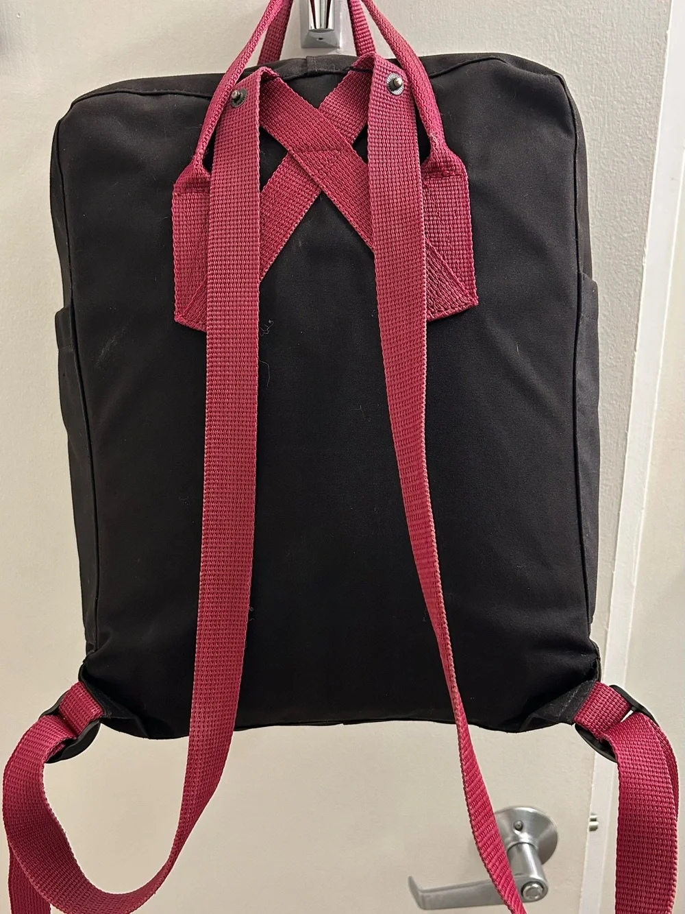 Fjallraven Black Backpack with Red Handles